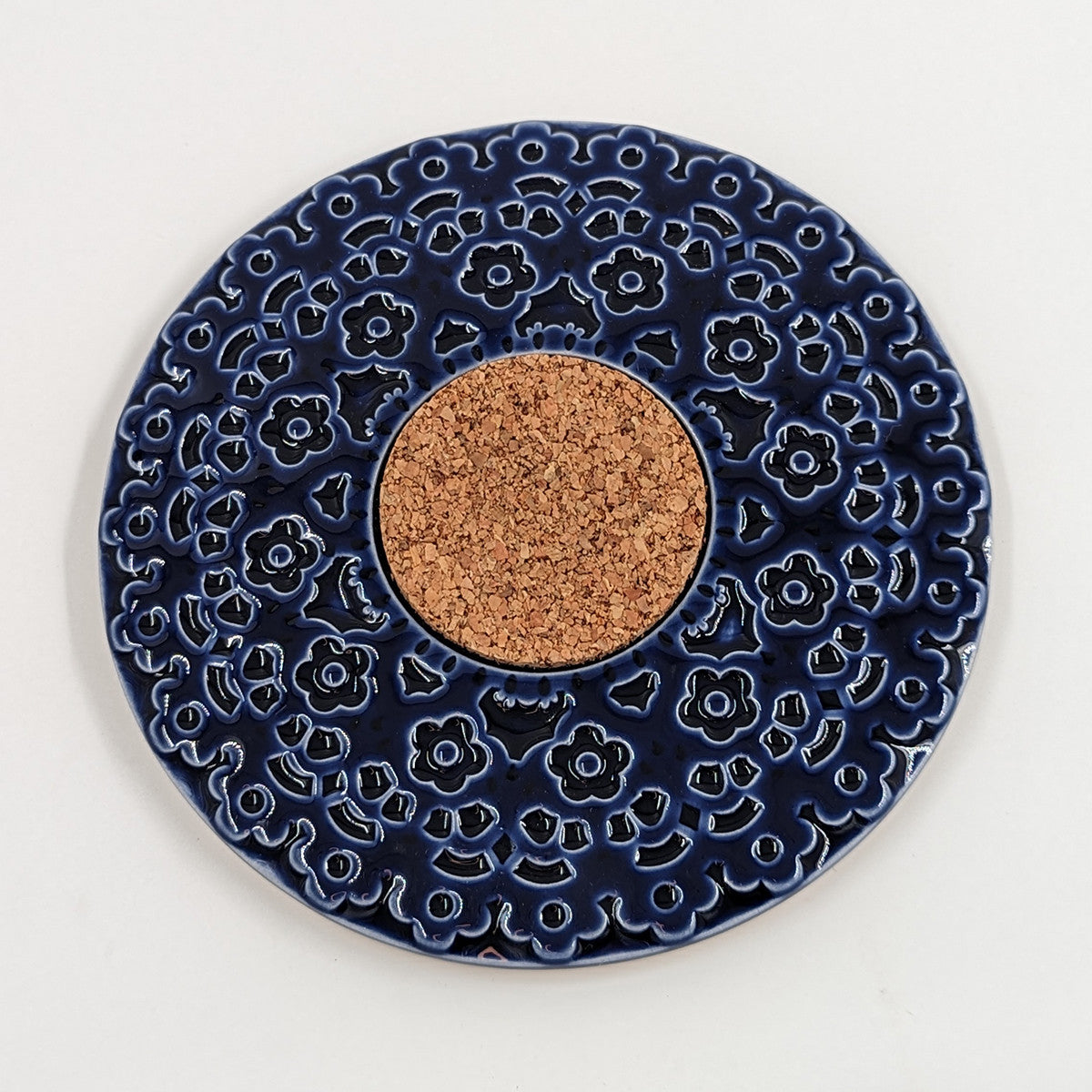 Bordskåner i keramik og kork, Blå